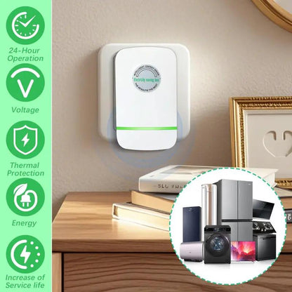 Smart energy saving device plugged into a kitchen wall outlet near a refrigerator